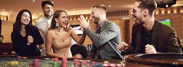 Players enjoying new casino and sports games on 9995 platform with neon glow